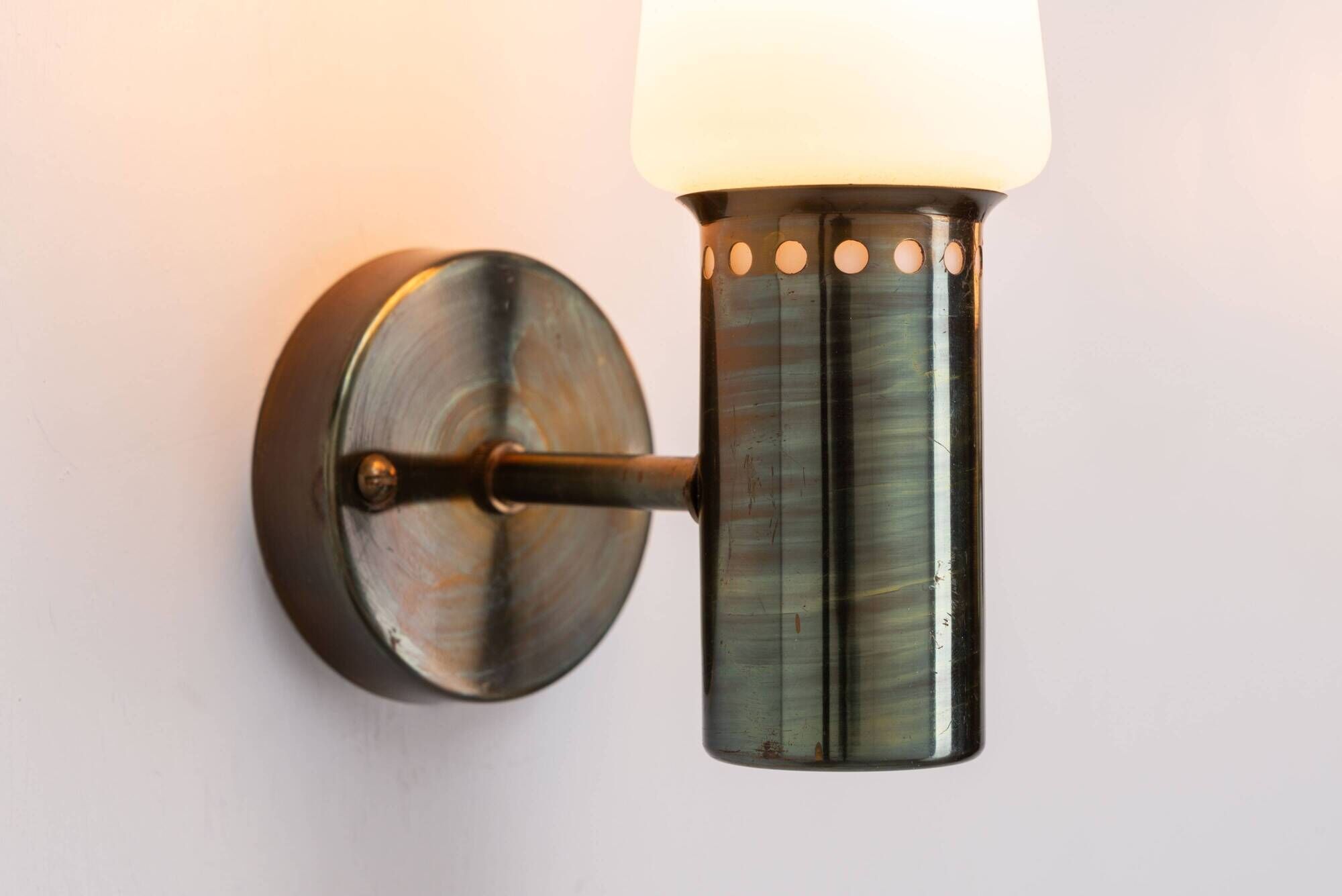 Set of two Hans Agne Jakobsson wall lamps with opal glass shades