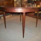 Oval mahogany table with extension cords
