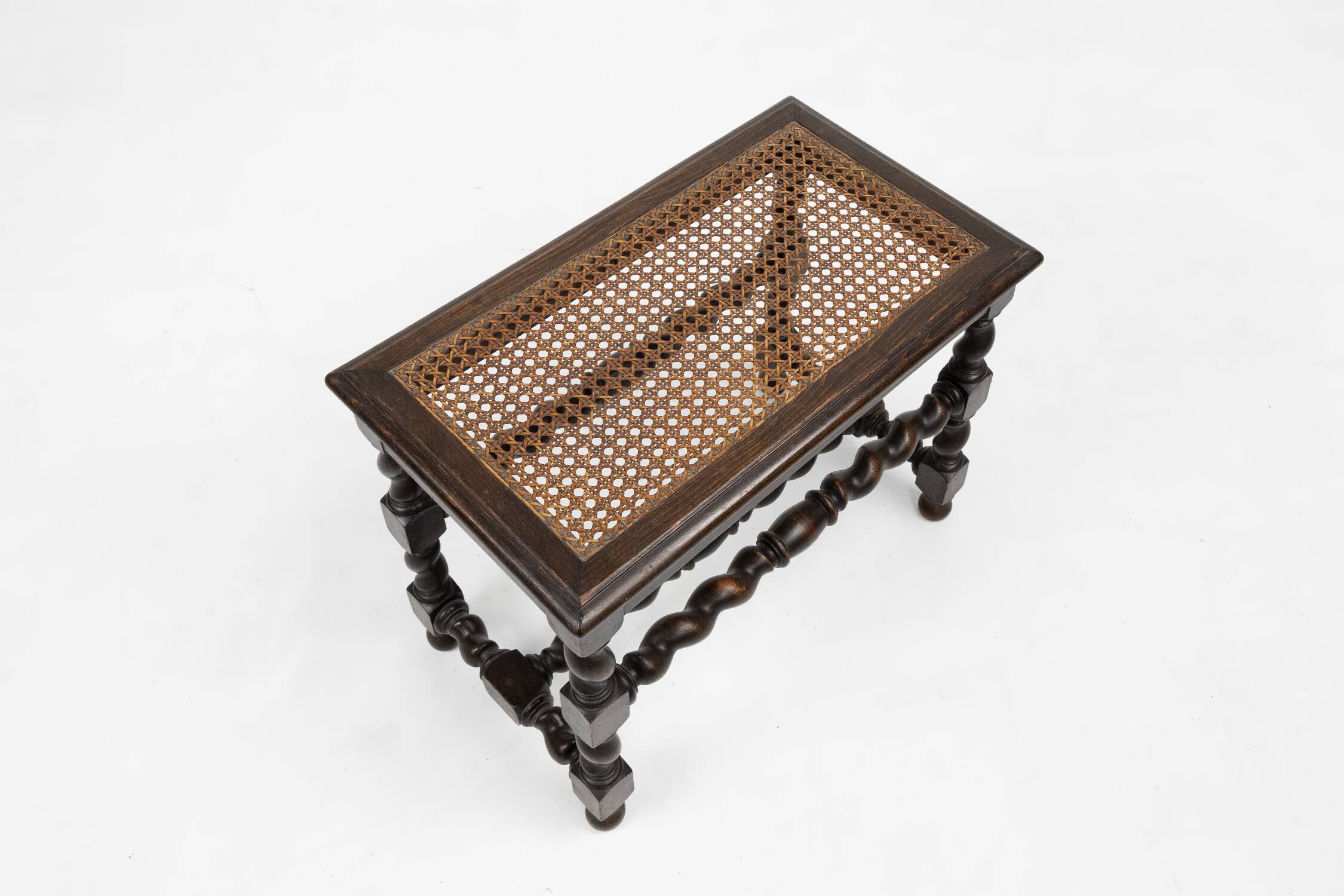 Antique French wooden stool with rattan top, ca. 1880