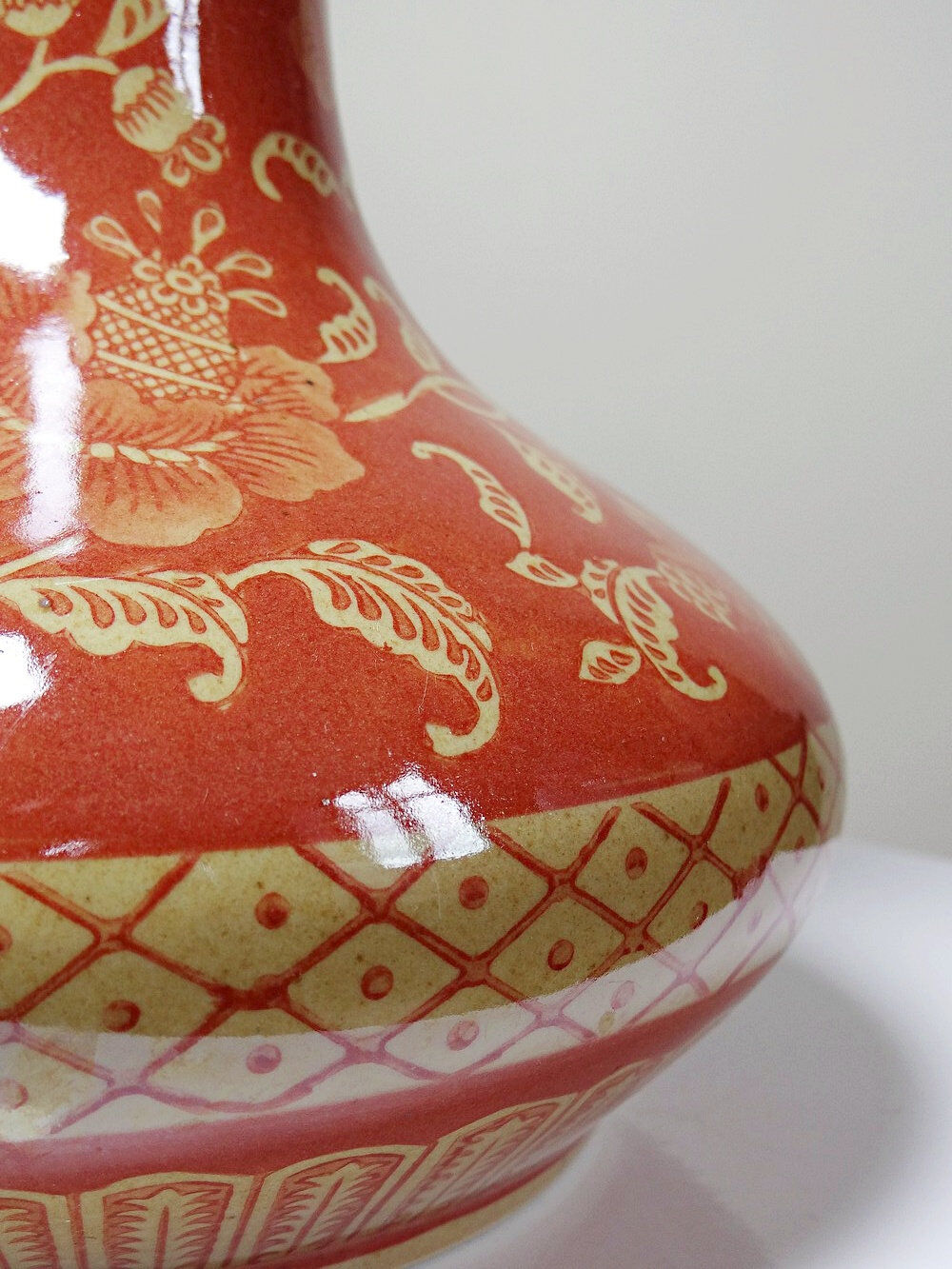 20th century Chinese vase, hand-painted ceramic in an unusual red hue.