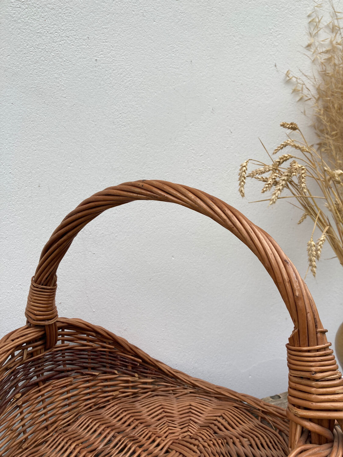 Large old woven wicker log basket