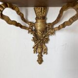 baroque shelf in wood and bronze ribbon