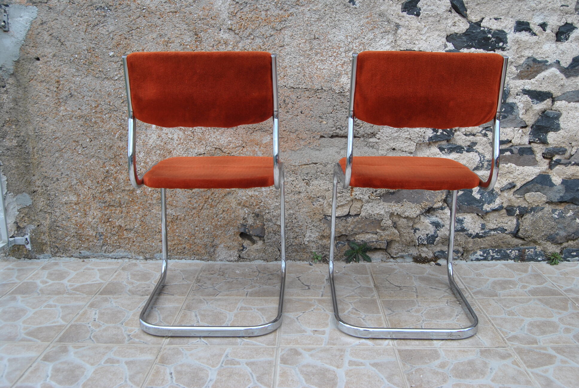 Pair of orange velvet chairs Roche Bobois 70s