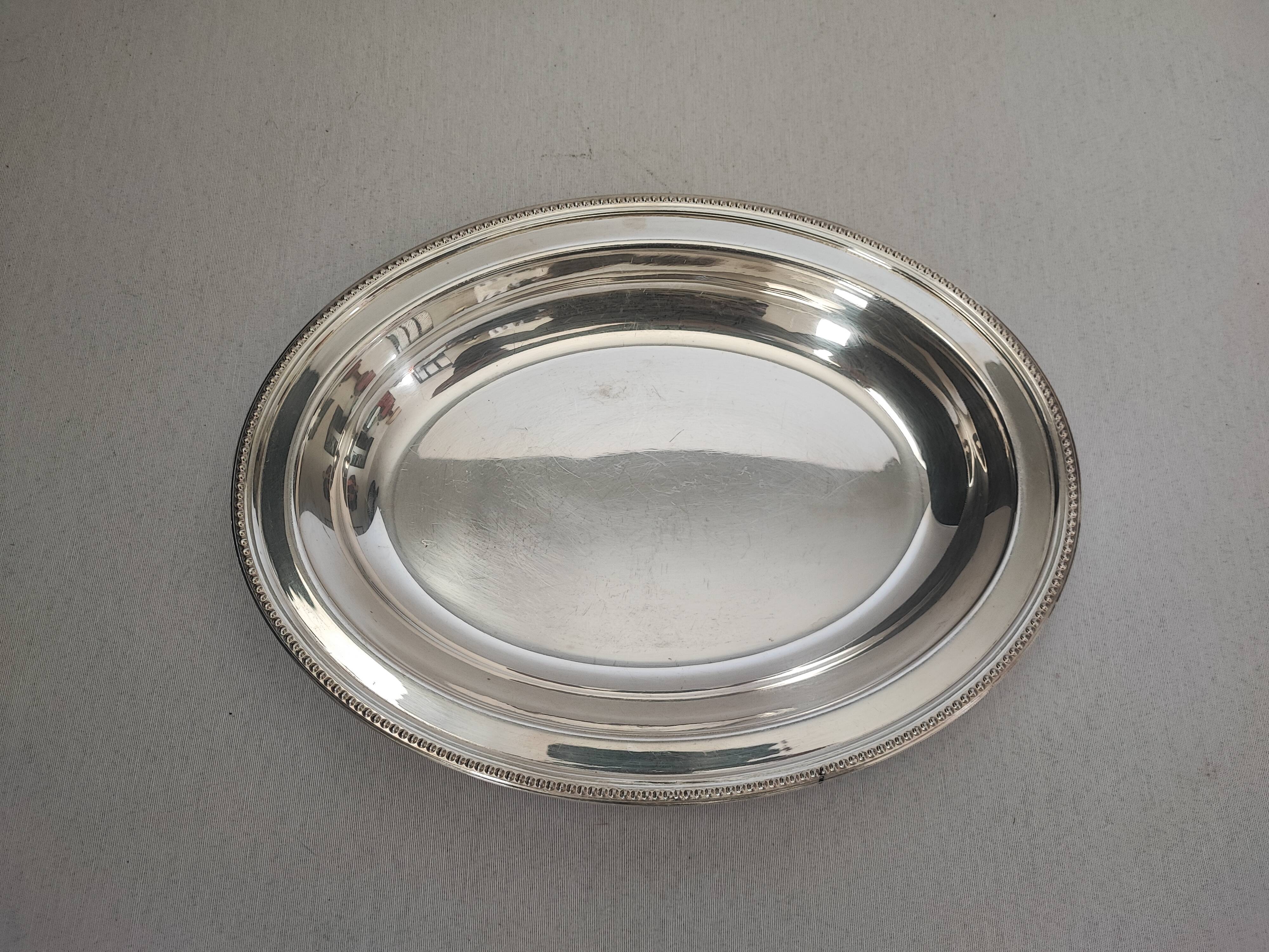 silver-plated metal salad bowl