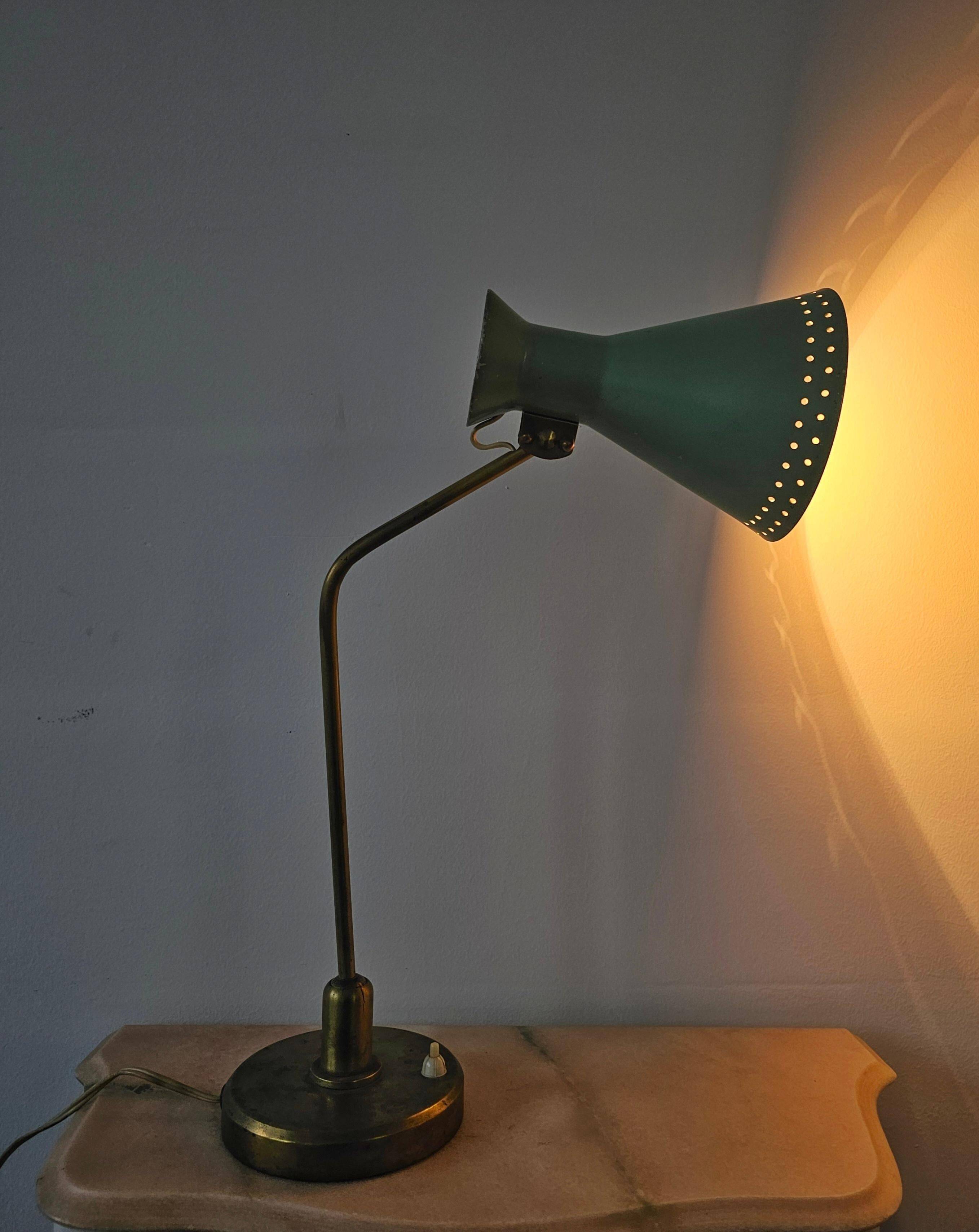 Mid-Century table lamp with a conical metal shade, attributed to Stilnovo.