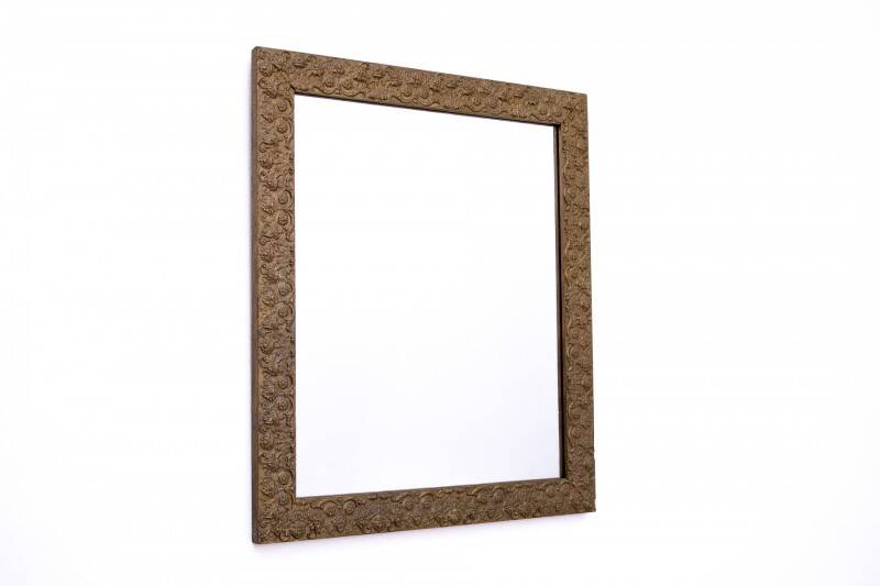 Old mirror in a gold frame.
