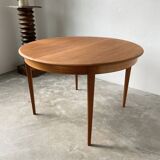 Scandinavian round teak table with extension
