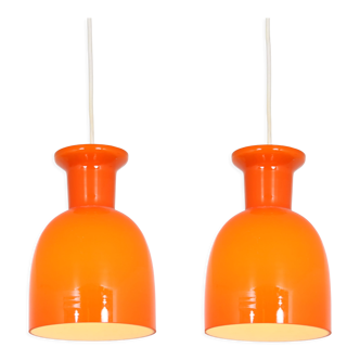 Pair of orange hanging lamps by Raak, the Netherlands, 1970