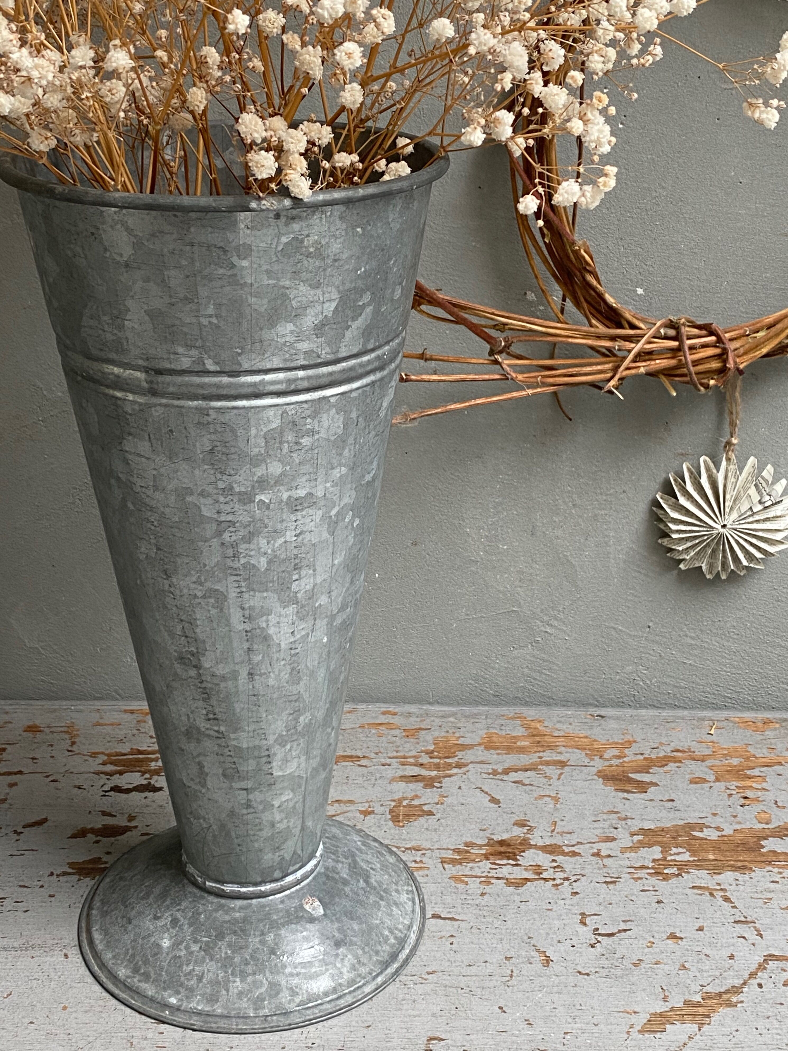 Old zinc florist's vase