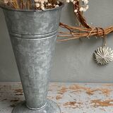 Old zinc florist's vase