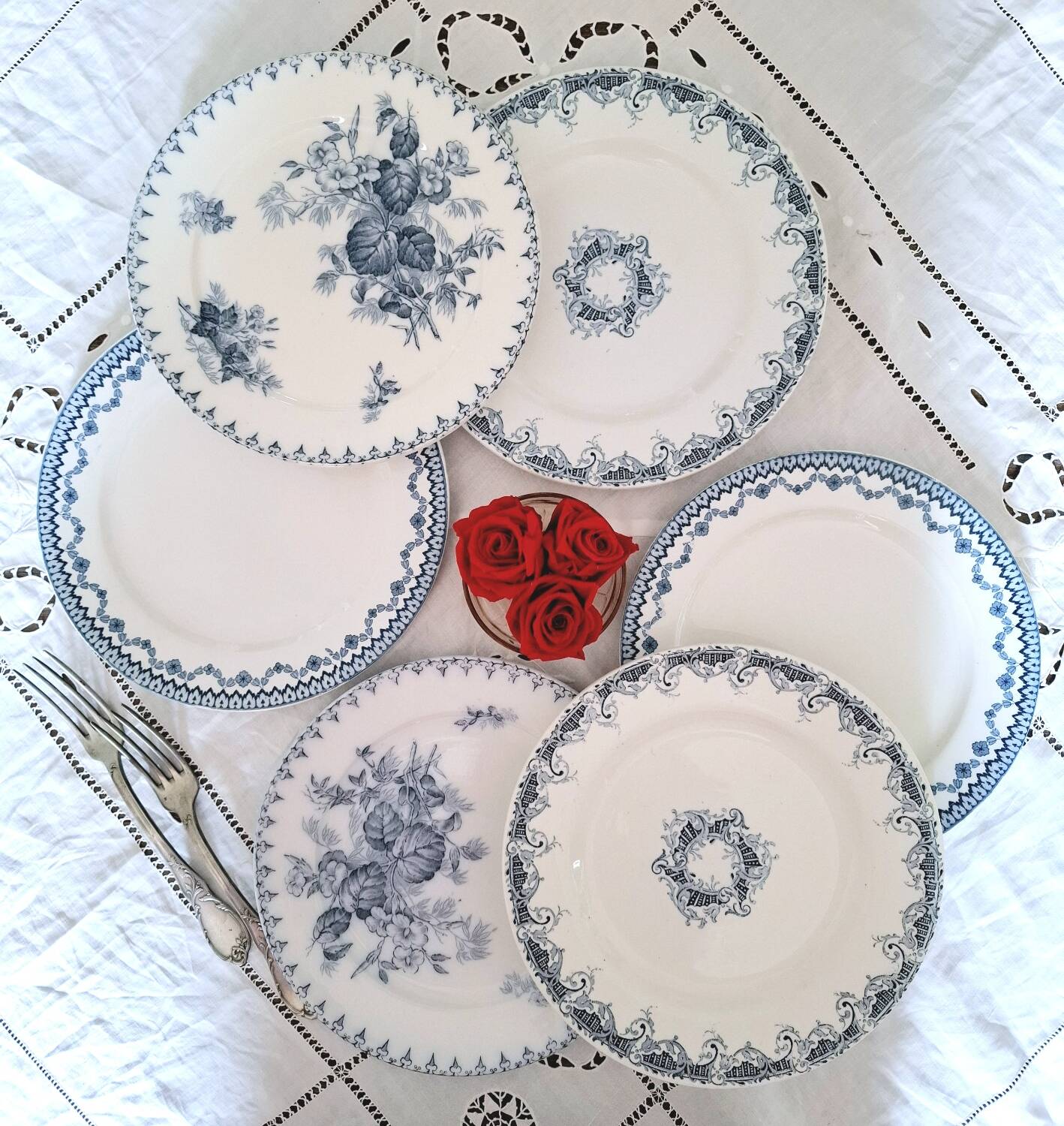 Old mismatched flat plates in iron earth earthenware