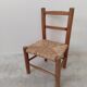 Vintage children's chair in wood and straw