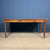 Antique cherry wood dining table from France.