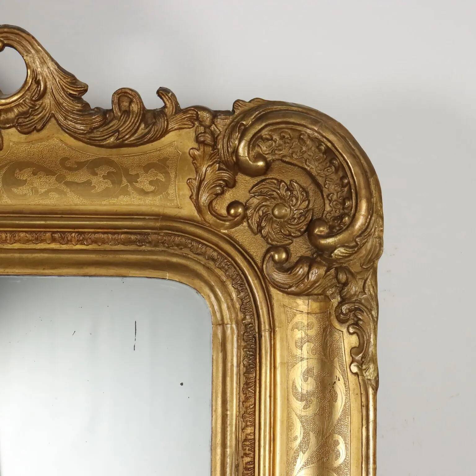 Antique mirror in carved fir, France, mid-19th century.