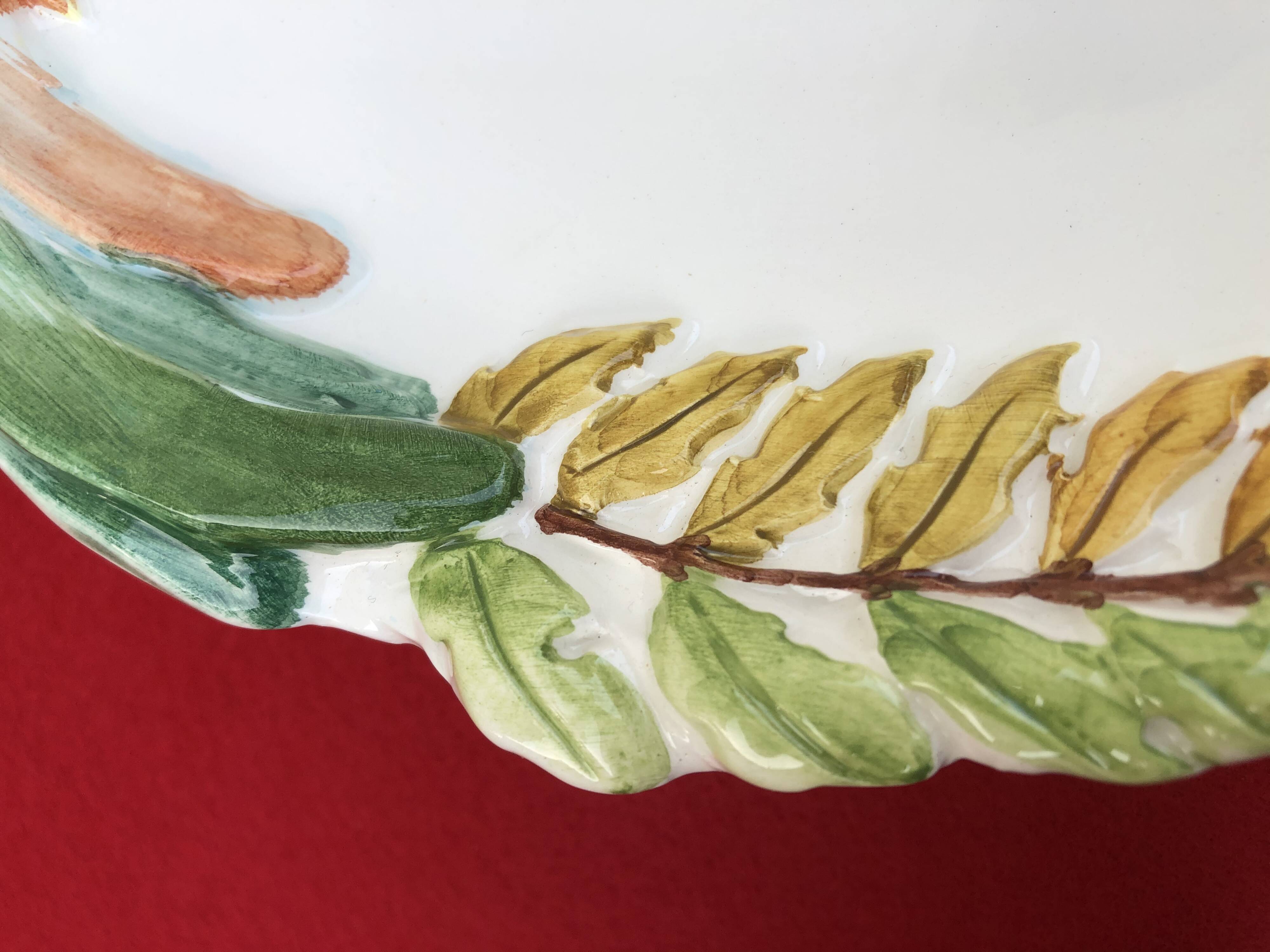 Lancel Paris ceramic dish with embossed parrot decoration