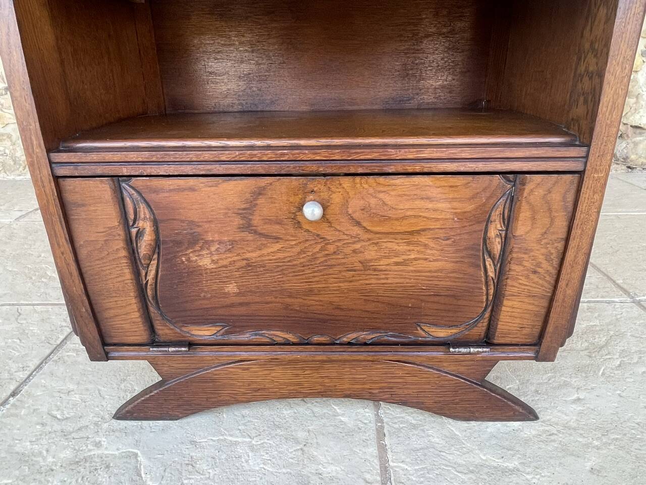 Art Deco bedside table in walnut, black marble top, circa 1920.