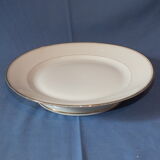 White porcelain and gold display cut
