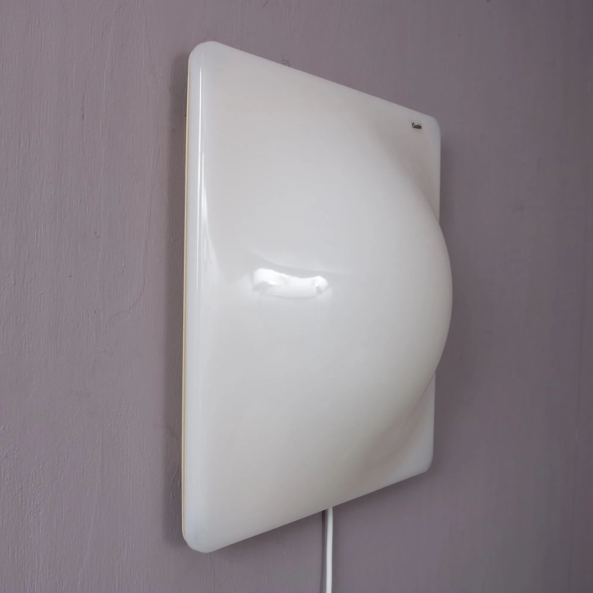 1970s "Dada" wall lamp by Harvey Guzzini for iGuzzini, Italy.