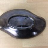 Empty black and red ceramic Elchinger pocket
