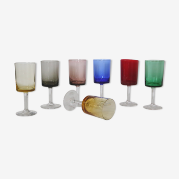 Set of 7 glasses on foot in colored glass, vintage