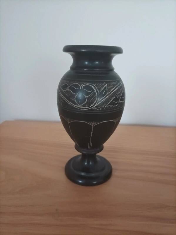 Black vase signed