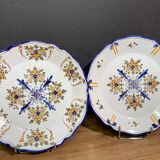 Pair of Nevers earthenware plates signed Georges