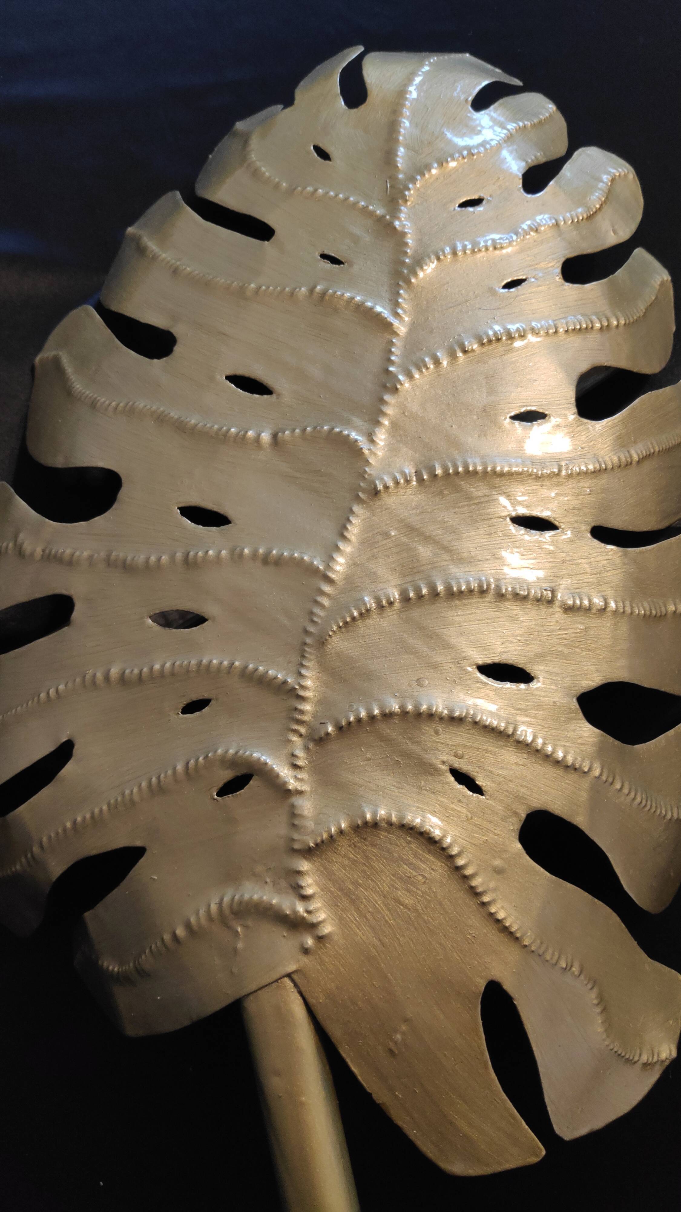 Pair of hammered gold metal wall lamps