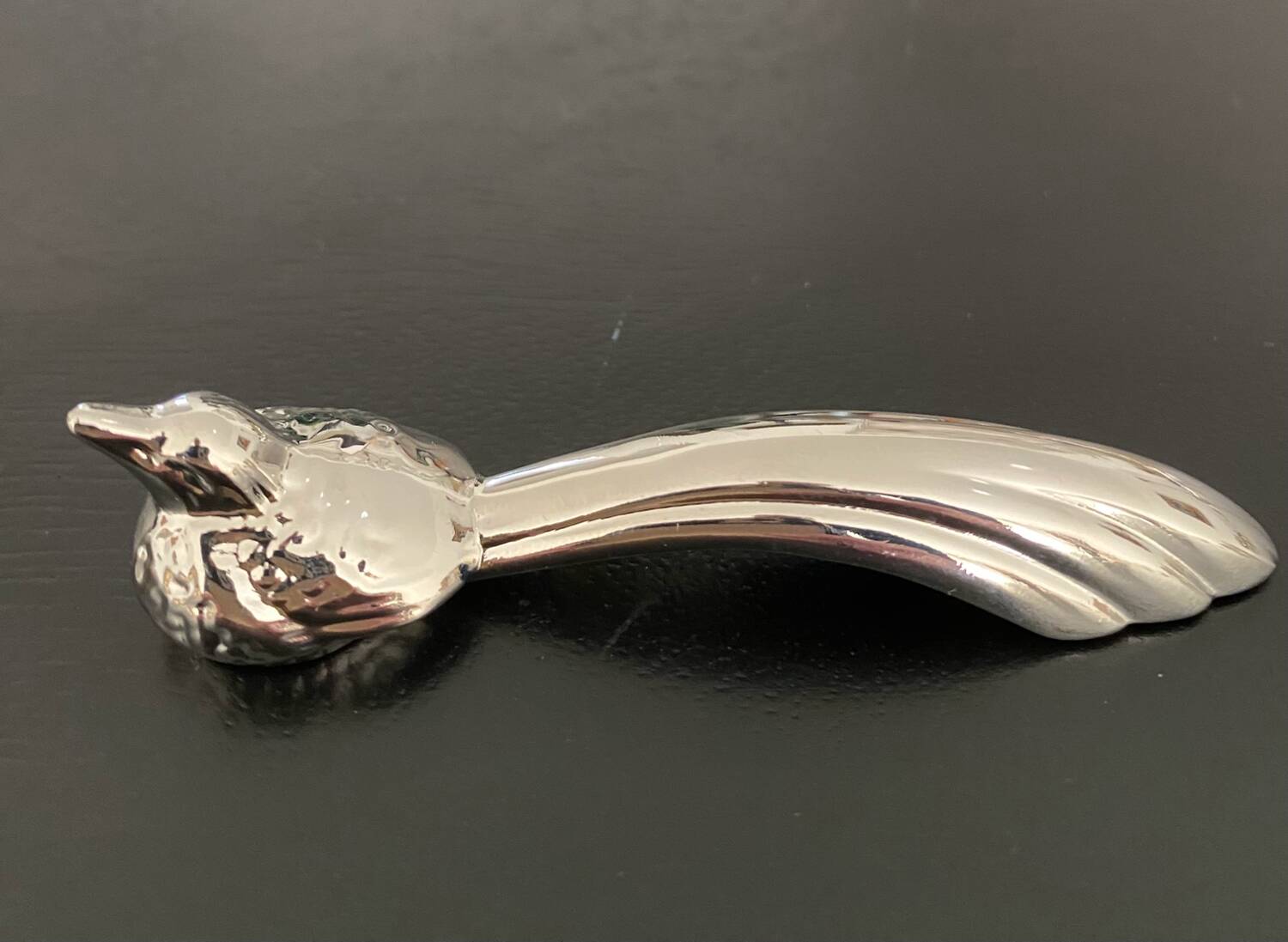 8 various animal knife holders in silver-colored metal
