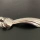 8 various animal knife holders in silver-colored metal