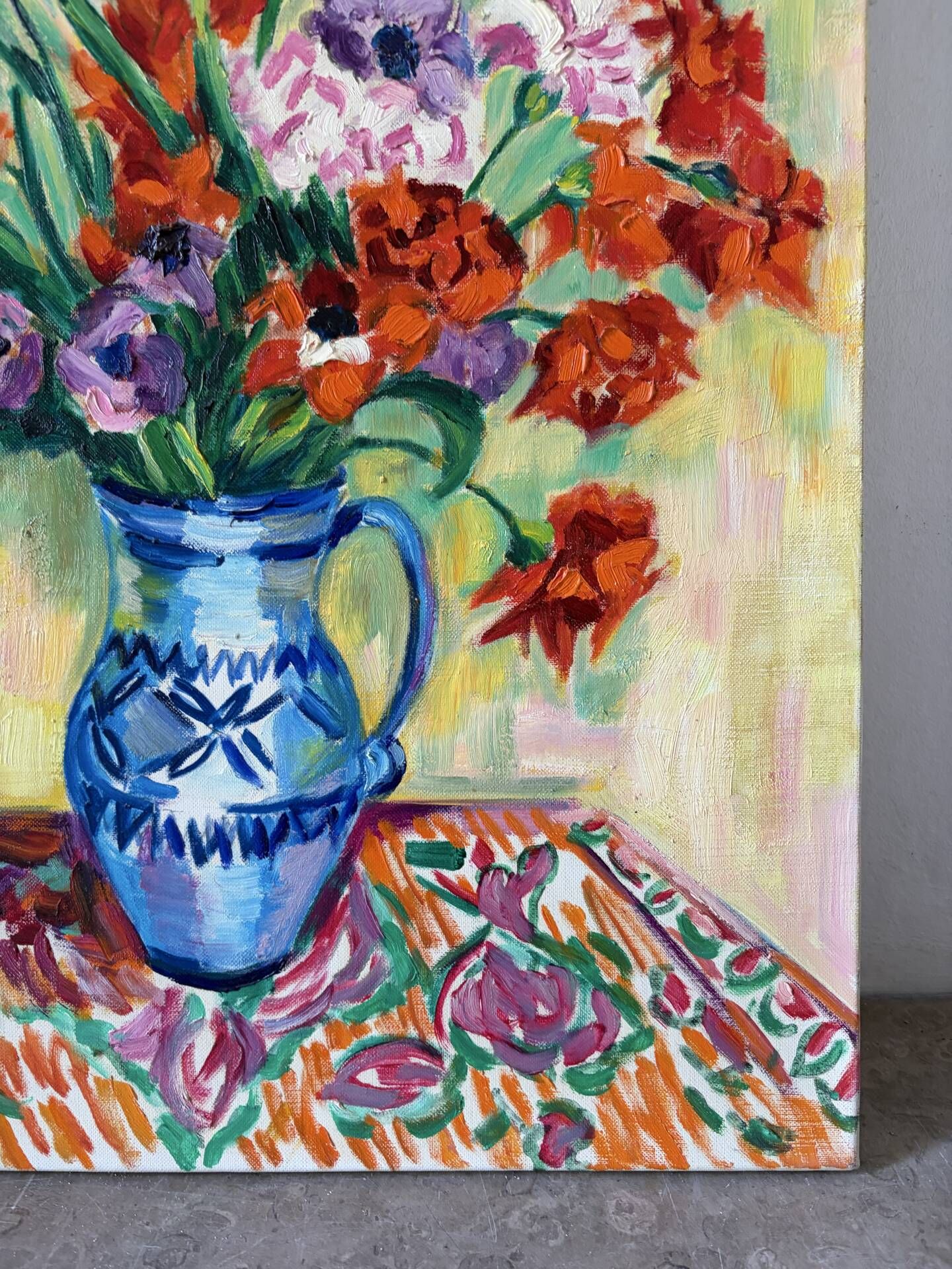 Iris and orange carnations, oil on canvas signed Gisèle Renaut.