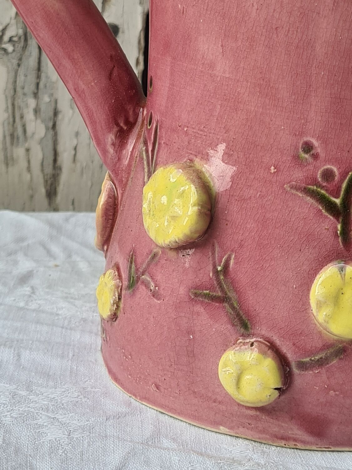 Glazed terracotta pitcher with mimosa decoration