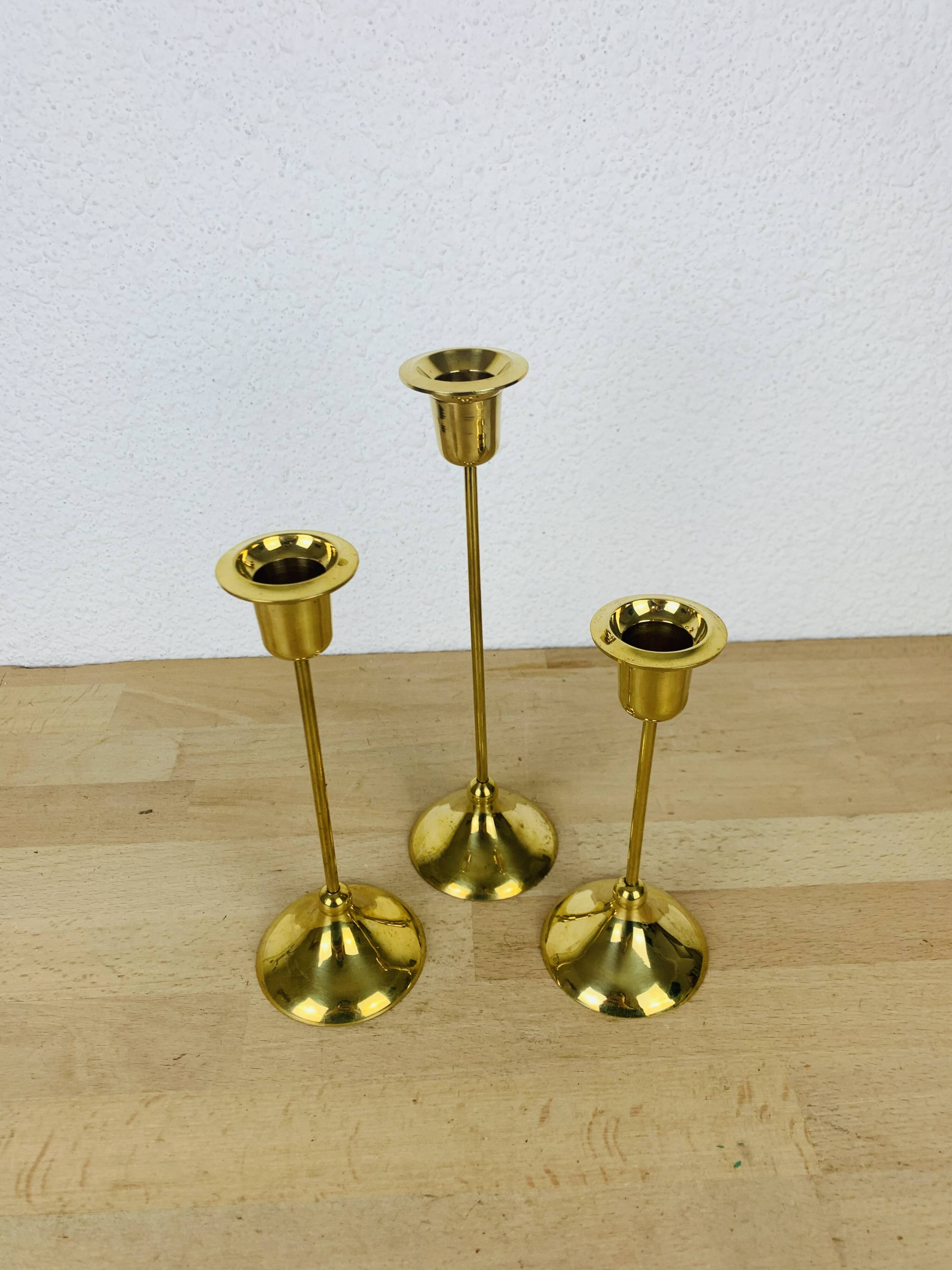 3 Scandinavian style gold-plated brass candle holders