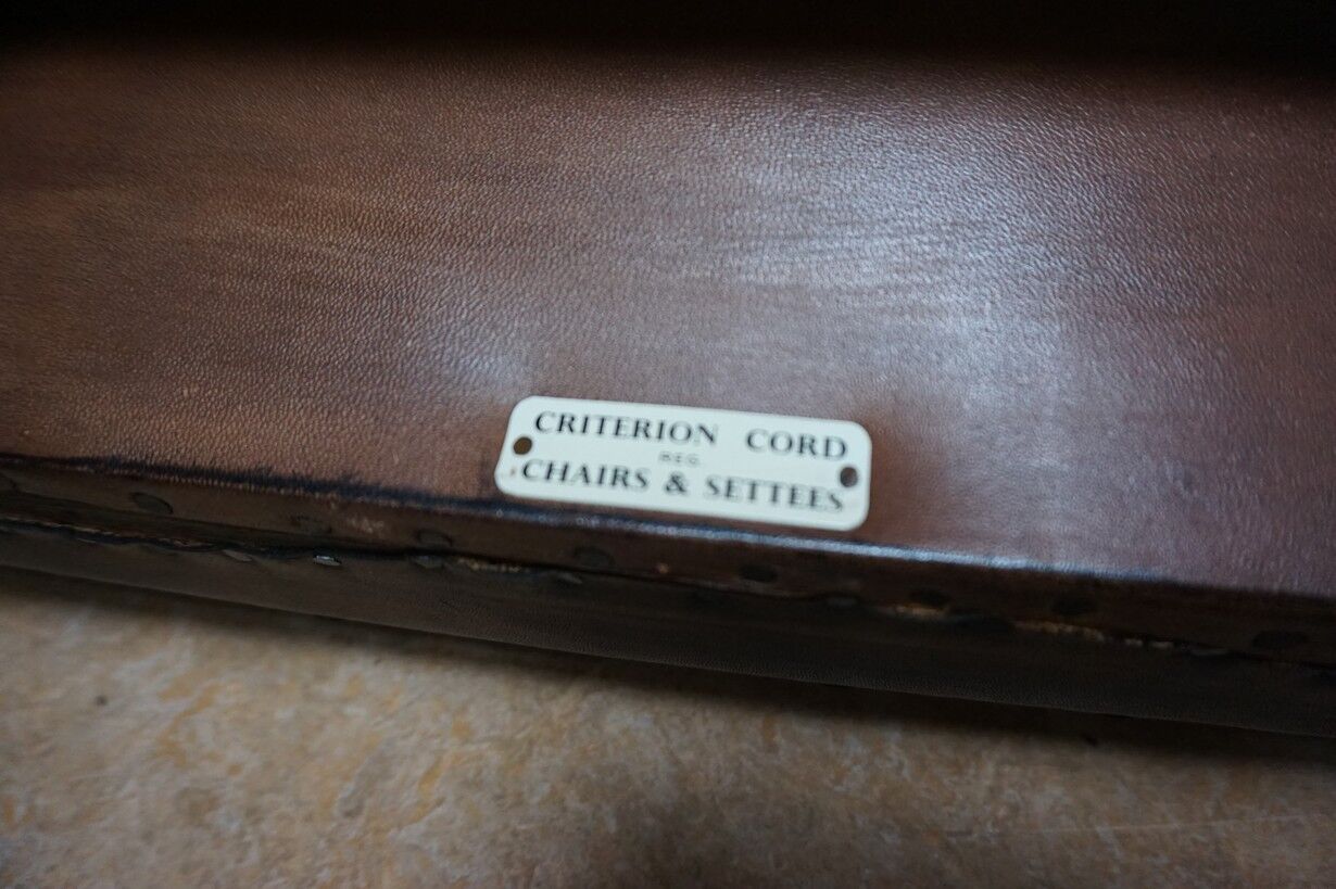 English high back cognac leather wingchair by Criterion cord