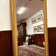Antique English golden barock mirror mirror with large ornament