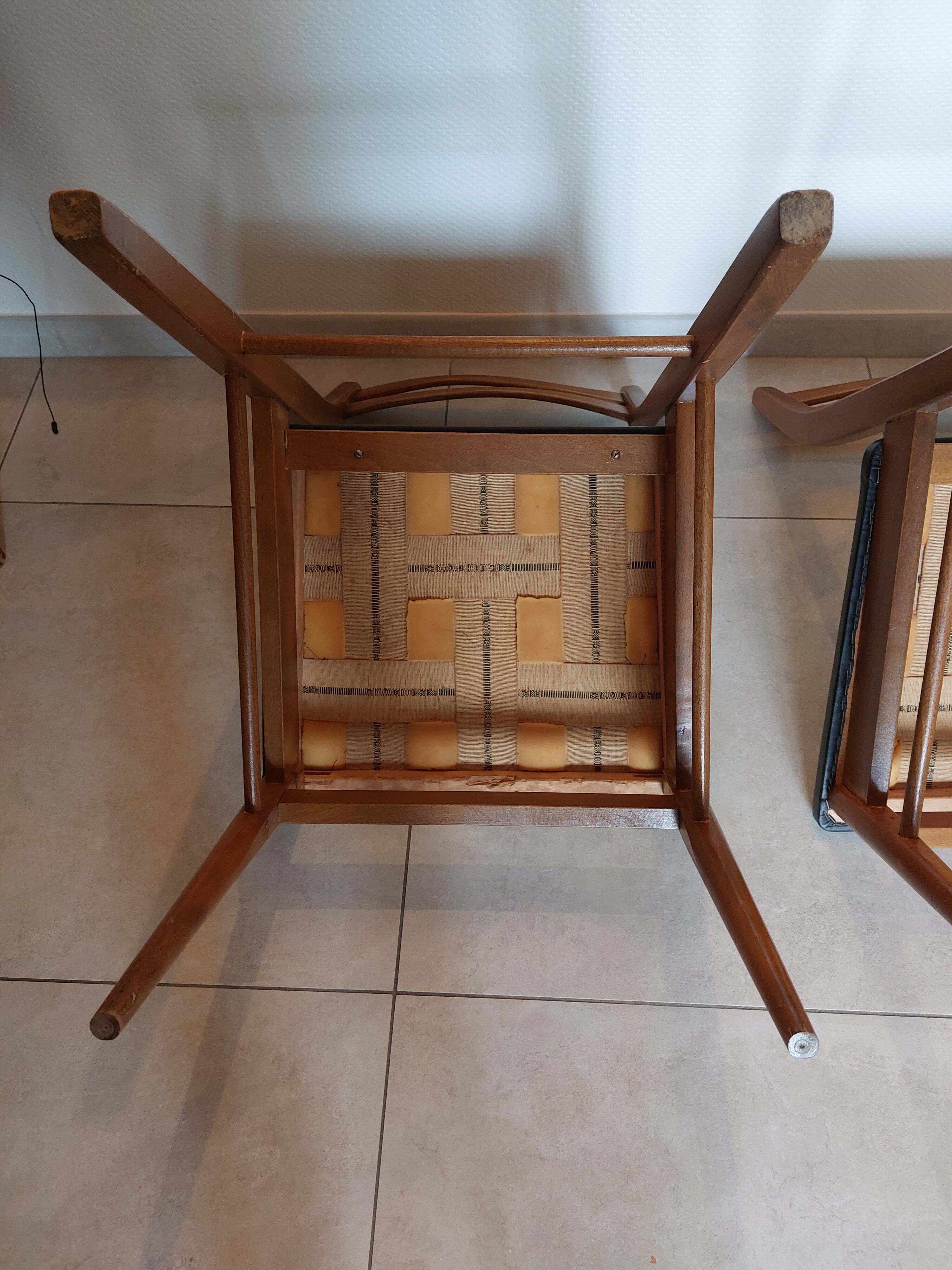 5 Scandinavian style chairs, wood and black faux leather.