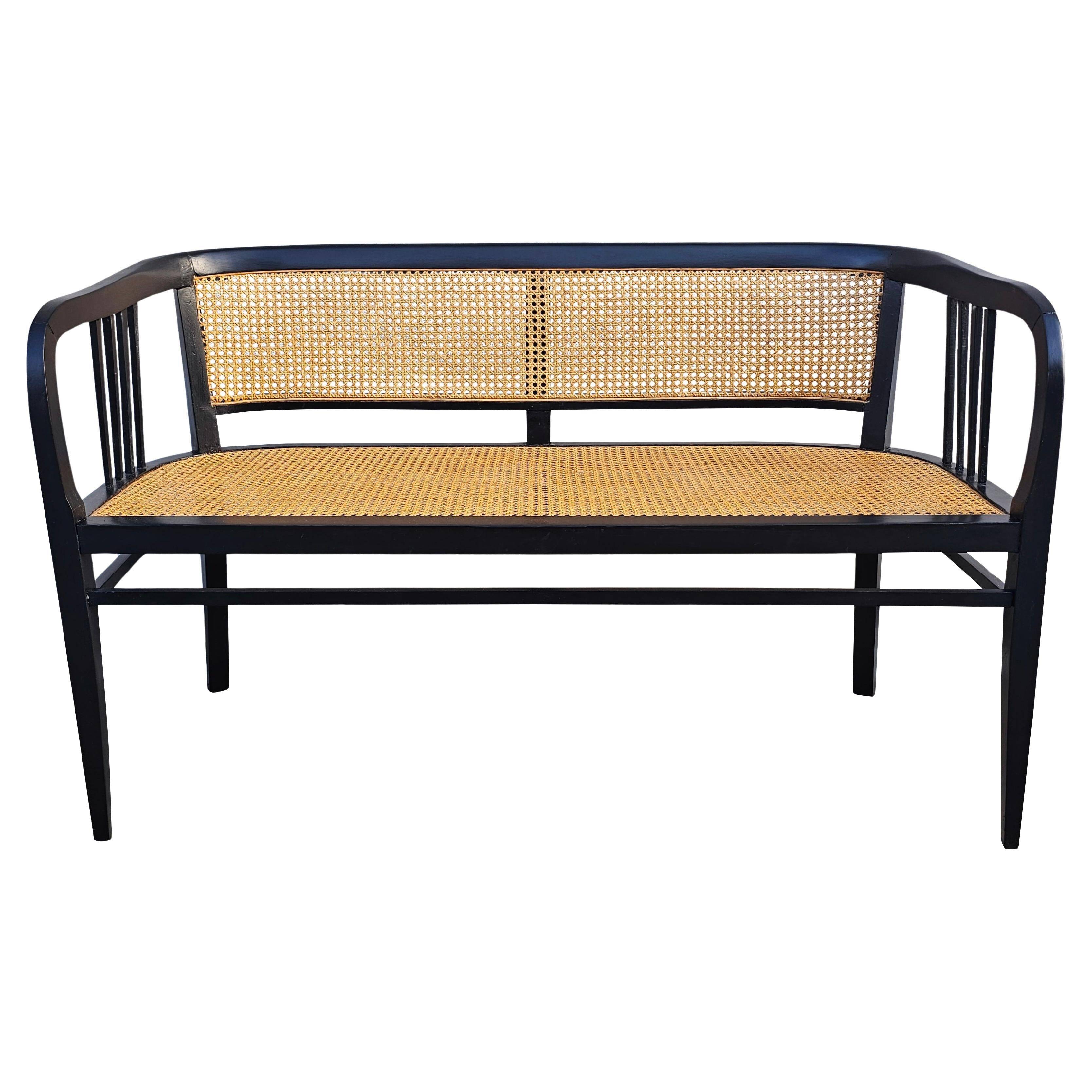 Vienna Secession beech canapé with cane seat and backrest.
