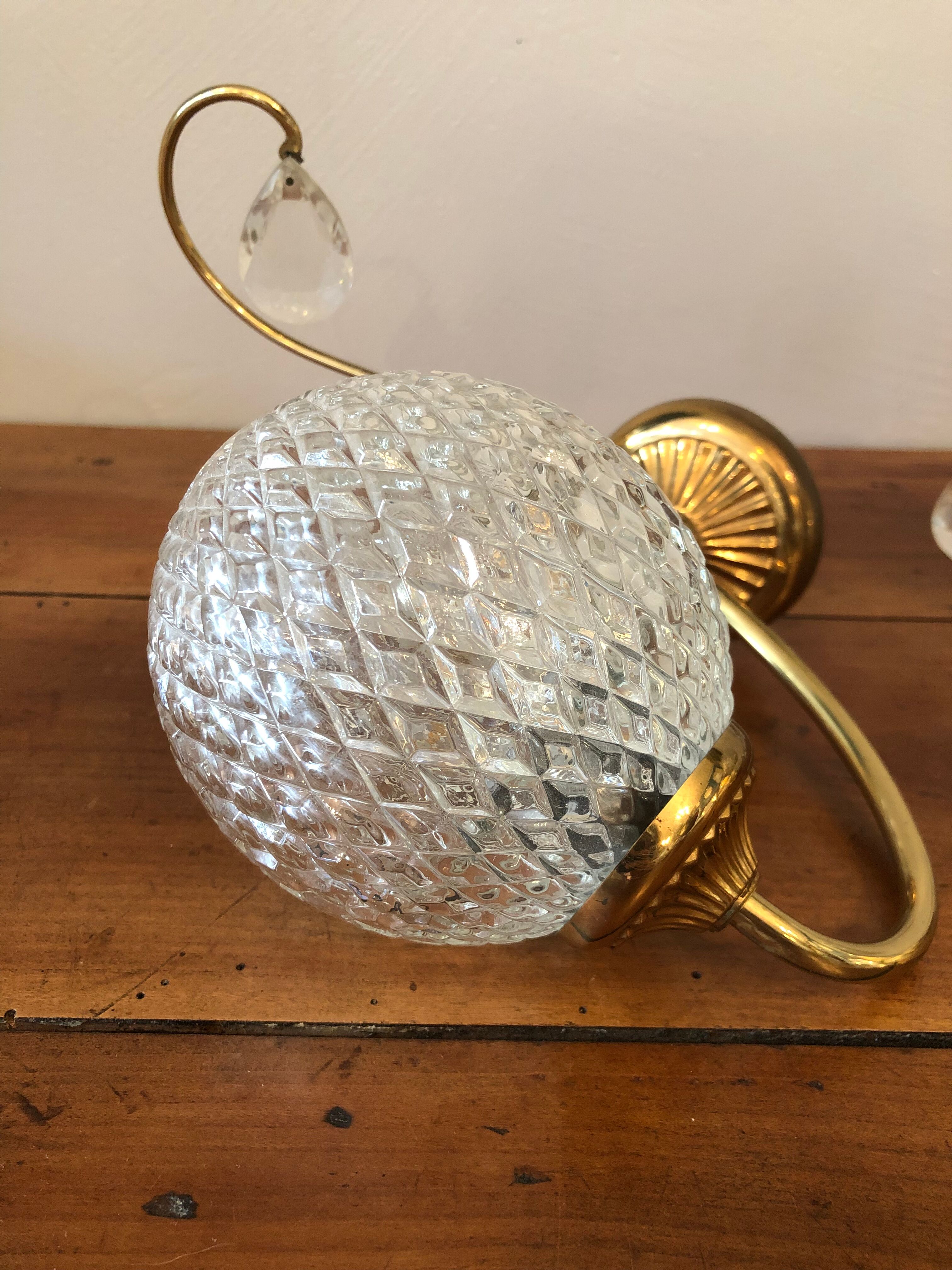 Duo of brass and glass wall lamps
