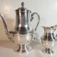 Louis XVI style silver-plated teapot and milk jug