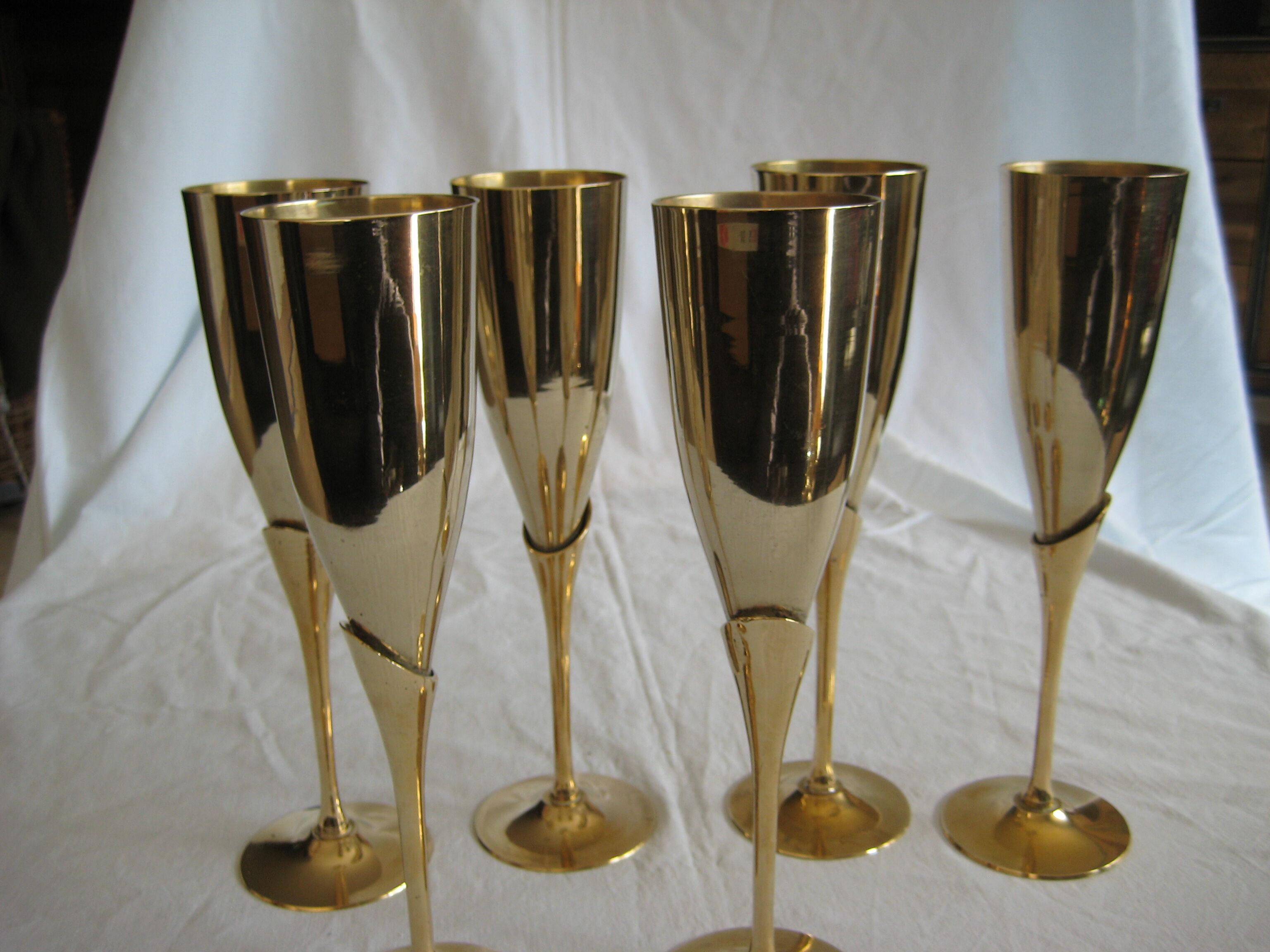 Brass champagne glasses