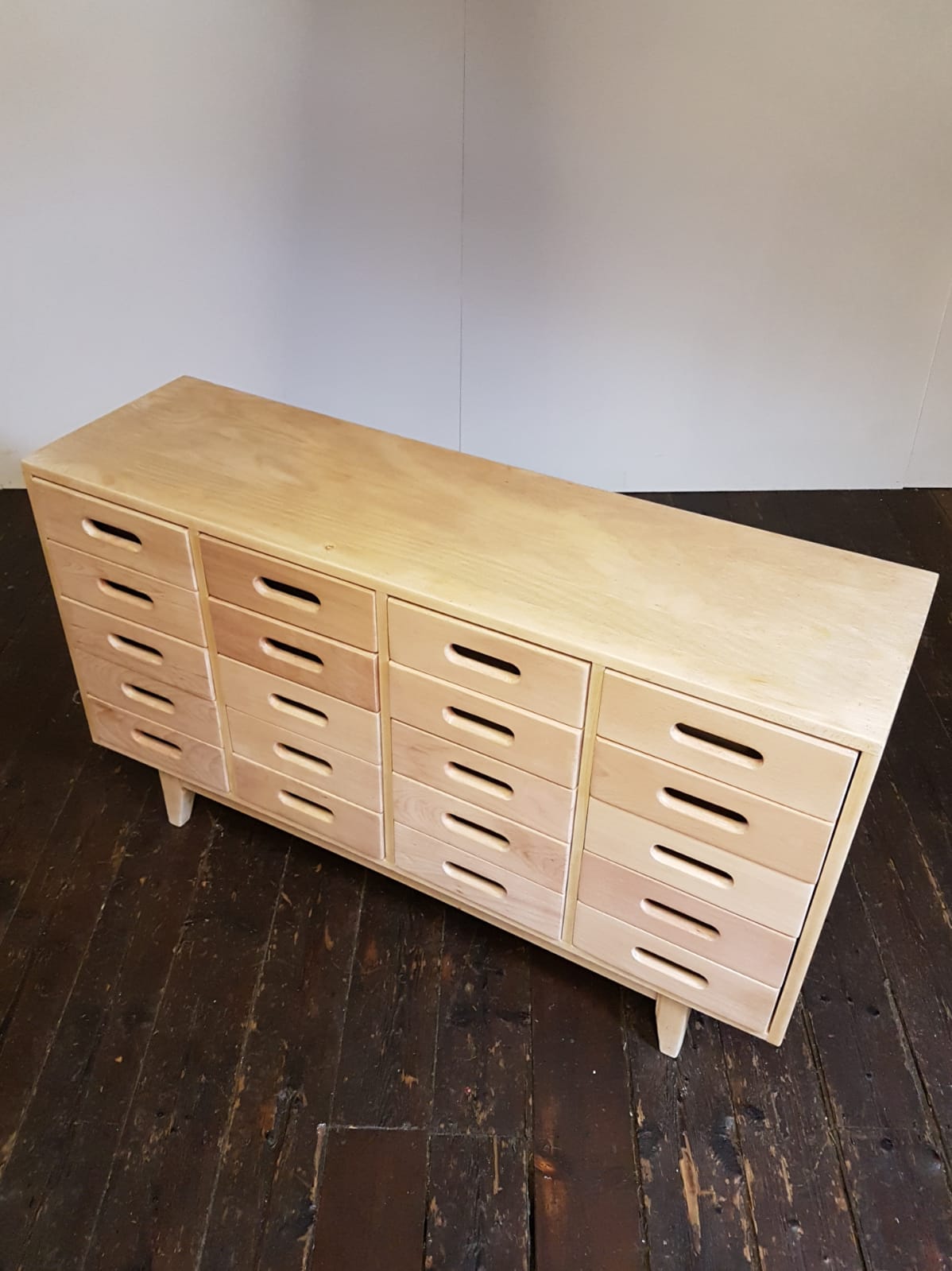 Merchandising chest of drawers by James Leonard Esavian