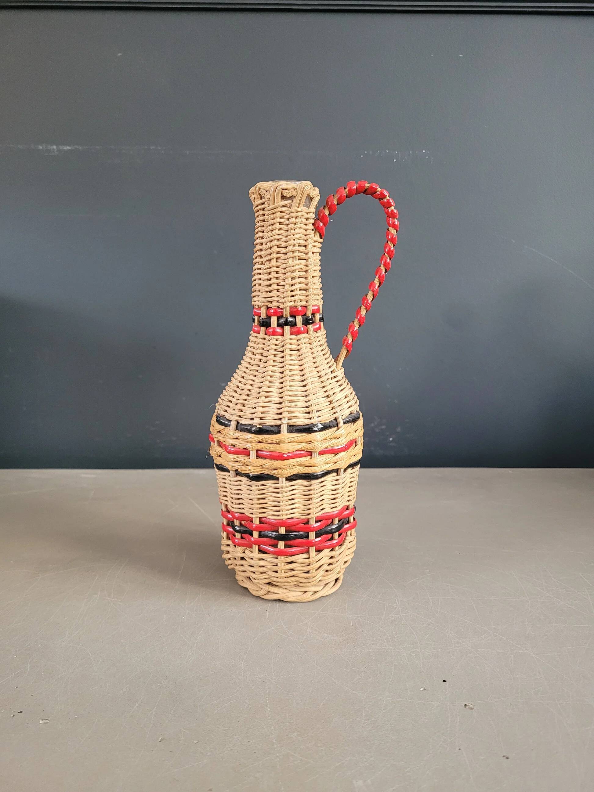 Vintage wicker carafe bottle
