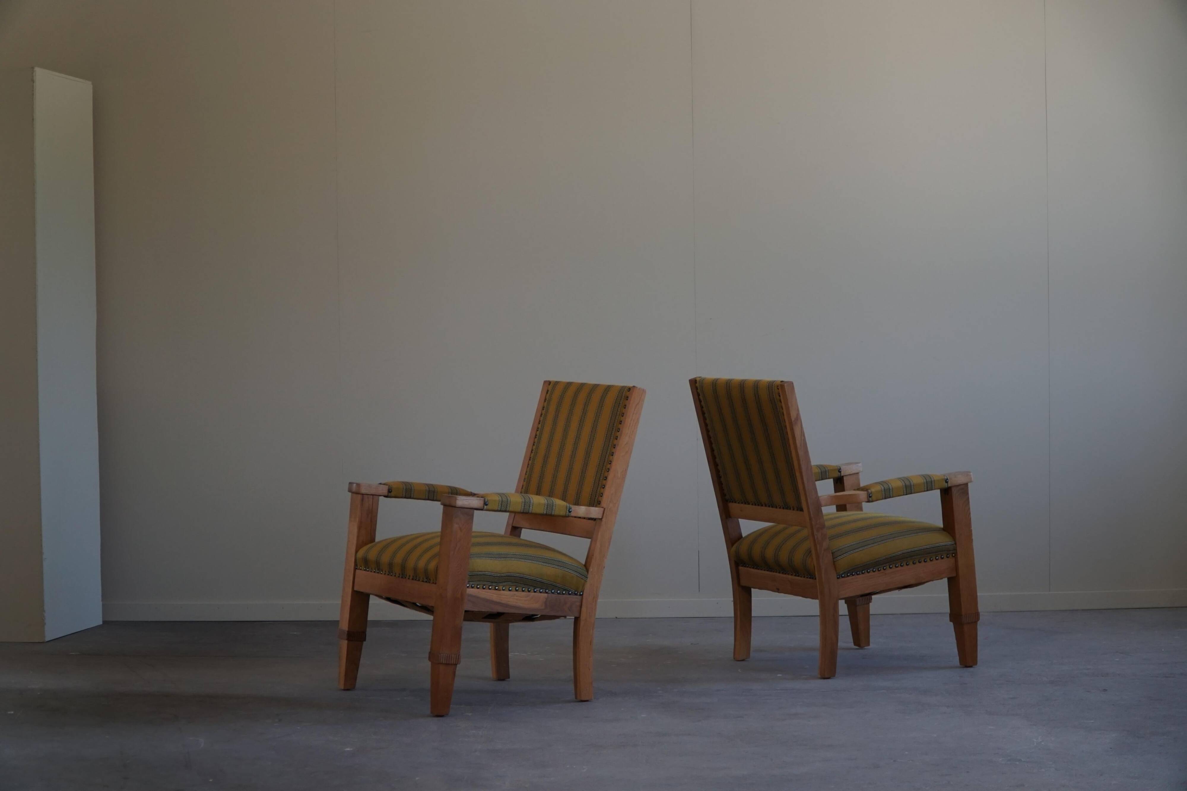 Pair of Art Deco armchairs in oak and fabric, Danish cabinetmaker, 1940s