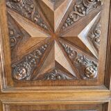 Carved cherubs cabinet