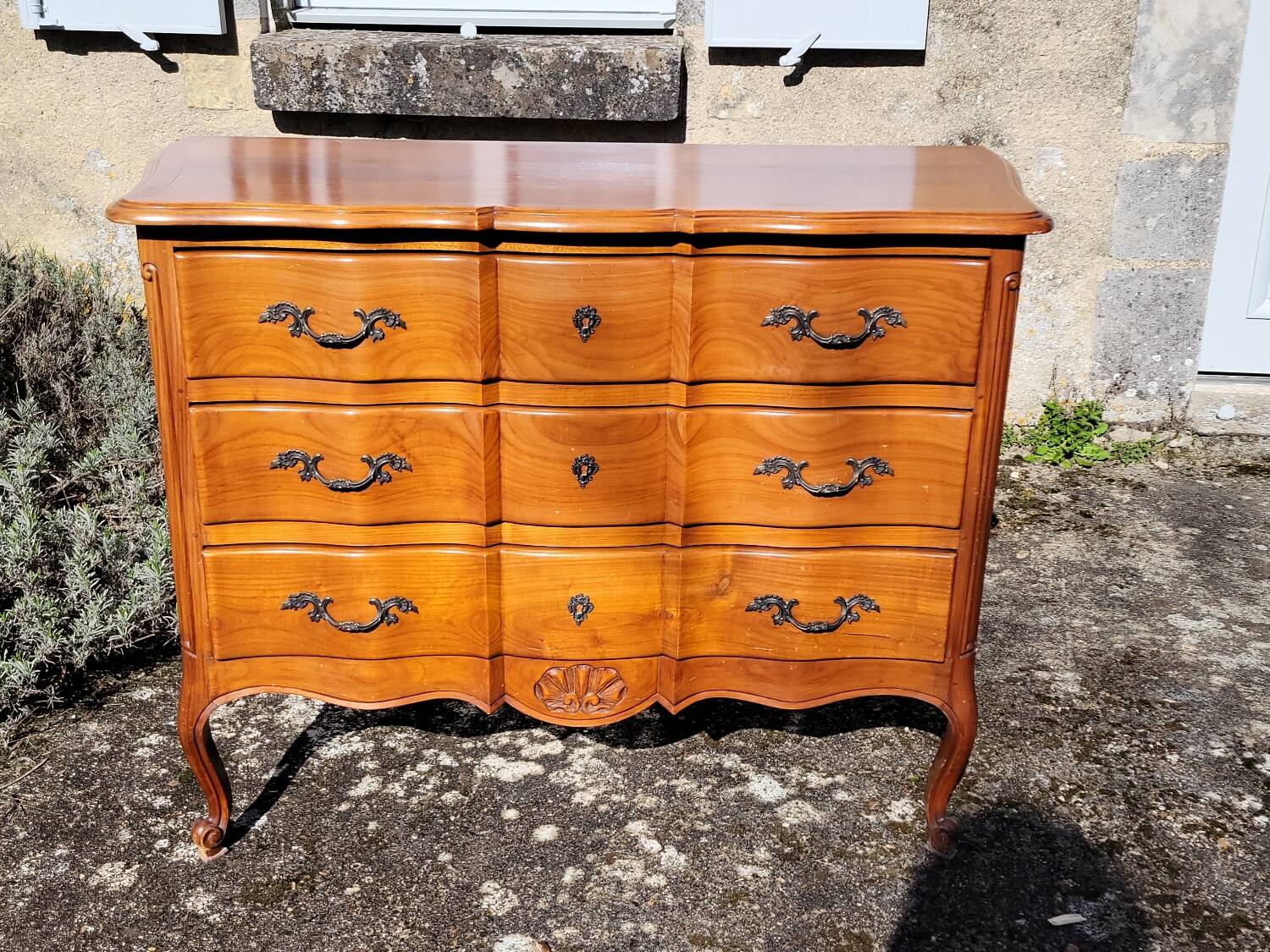 Louis XV style crossbow commode in cherry wood