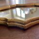 Miroir doré de style Louis XV sobre 32 X 22