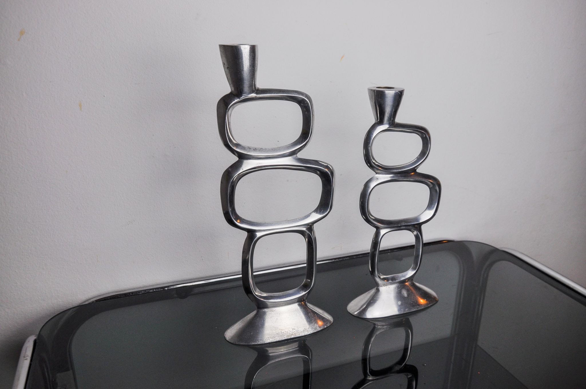 Pair of circle candlesticks by Matthew Hilton, England, 1980