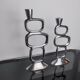 Pair of circle candlesticks by Matthew Hilton, England, 1980