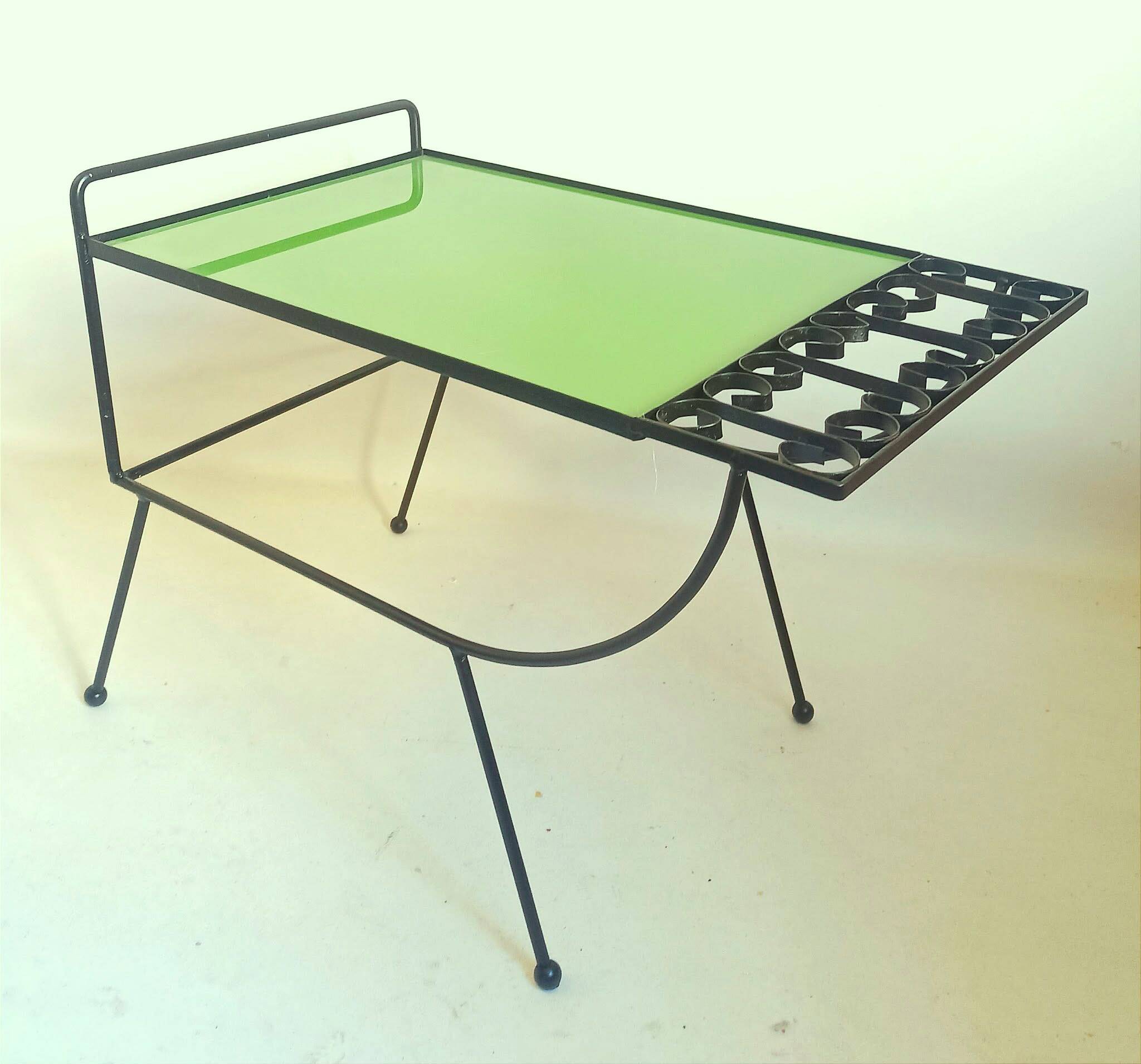 1960s side table with a lime green top, width 65.5 cm.