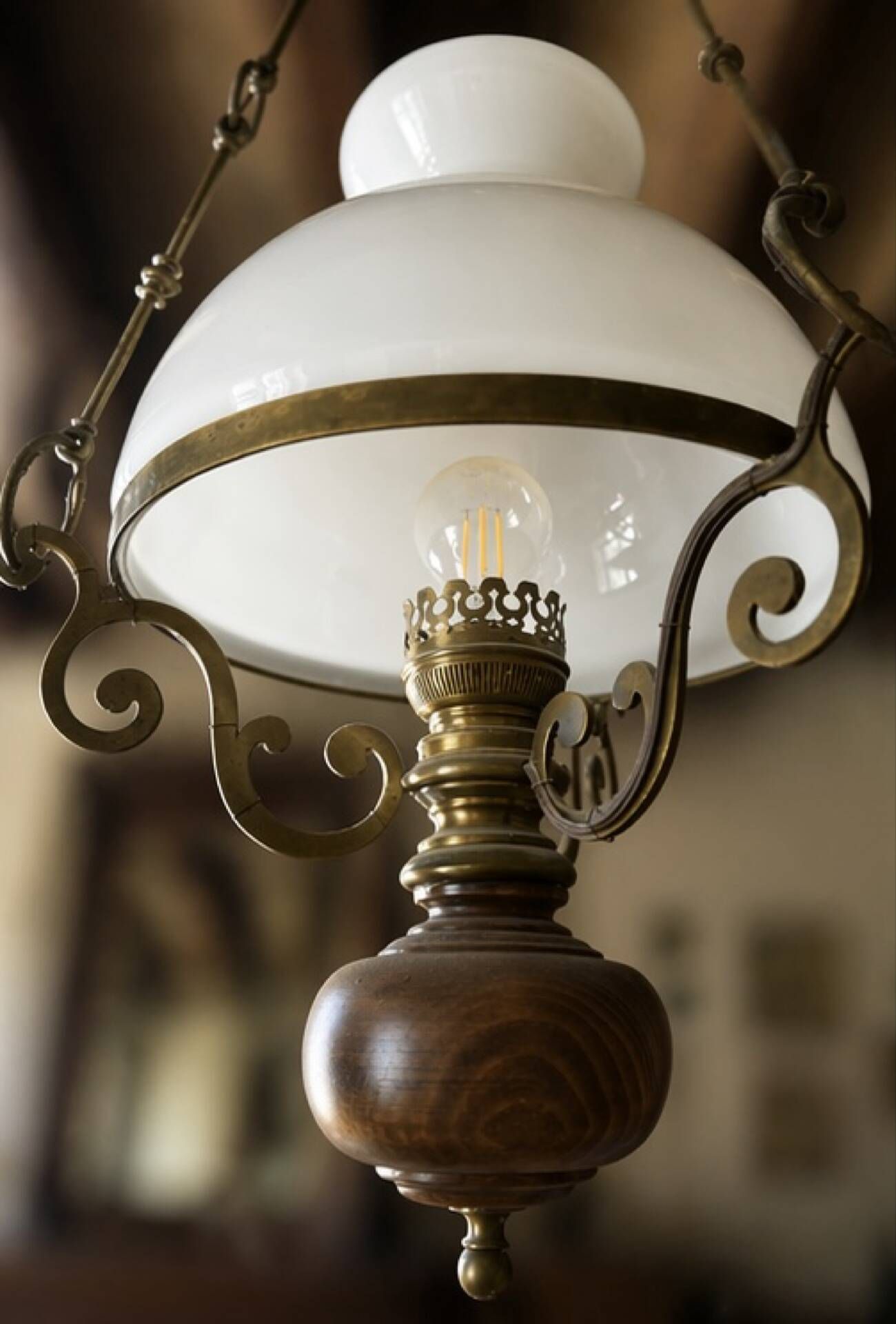 Antique Napoleon III suspension in brass, wood, and opaline glass.