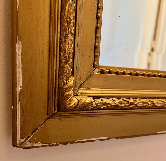 Antique gilded trumeau mirror in Louis XVI style